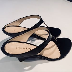 PRADA | patent nero leather thong wedge sandal